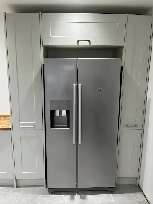 Bespoke fitted kitchen with tall larder units, Bexley