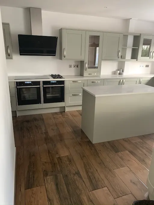 Bespoke sage green kitchen with island, Bexley